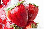 Fresh red strawberries being washed