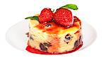 Cheesecake with fresh strawberries on white plate closeup