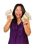 Excited Attractive Multiethnic Woman Holding Hundreds of Dollars Isolated on a White Background.