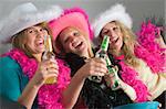 Dressed Up Teenage Girls Enjoying Drinks