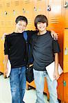 Two teen boys at school.  They are best friends.