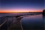 Dawn at a tidal pool in Bronte, a famous beach in eastern Sydney, Australia