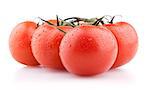 Red tomatoes with drops isolated on white