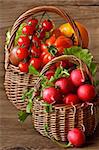 Kitchen garden vegetables in a wicker baskets.