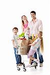 Family with cart with purchases isolated