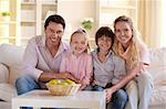 Happy family with children at home