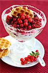 White yogurt with caramelized berries and honey waffle