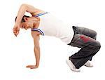 Teenage boy dancing hip-hop on white background