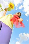 Beauty teen girl and sunflowers