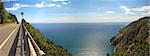 Aerial panoramic view on hill and highway running along Mediterranean Sea in Liguria, Italy.