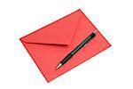 An isolated shot of a red envelope with a pen for someone to write a note or letter of correspondence.