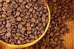 Macro studio shot of a cup of coffee beans