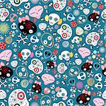 seamless pattern from laughing skull on a blue background