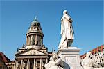 Detail of the French Dome and the monument to german poet Friedrich Schiller in Gendarmenmarkt Square in Berlin.