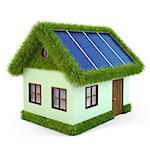 House from the grass with solar panels on the roof. isolated on white.