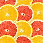 Abstract background of citrus slices. Close-up. Studio photography.