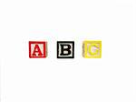 Child's multicolored letter blocks, ABC isolated on white