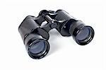 Used black binoculars with shadow on a white background. Shallow DOF