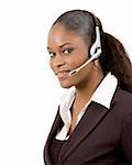 This is a close-up image of a female call operator. This image can be used for telecommunication and service themes. (Editted over white for easy clipping)