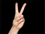 Peace and victory sign isolated on black with clipping-path included, just copy and paste into your work!