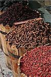 different spices in kegs - carcadeh, roots, pepper