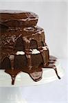 Tiered Chocolate Cake with vanllia filling and dripping chocolate topping and frosting