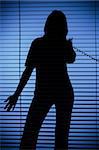isolated on blue silhouette of woman on the phone (blind)