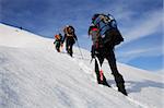 Alpinists climbing in Piatra Craiului Mountains, Romania.