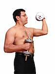 An muscles man is exercising with his dumbbells to stay in shape.