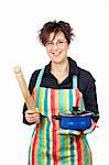 Housewife in apron holding a blue pan and wooden rolling
