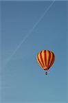 Balloon with danish flag in blue sky