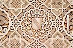 Detail of Islamic (Moorish) plasterwork and tilework at the Alhambra, Granada, Spain.