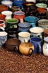 A collection of ceramic coffee mugs - background image for coffee establishments.