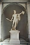 Sculpture of Perseus holding  head of the Gorgon Medusa in Vatican Museum in Rome Italy.