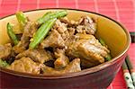 asian food of beef and vegetables on brown bowl