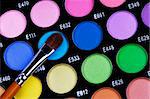 A make-up multi colored palette close up.