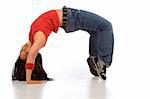 Break dancing girl in bridge pose (side view)