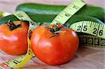 Tomatoes  & cucumber with measuring tape