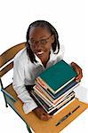Female African-American Student by stack of books