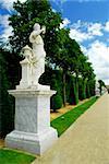 Statue on a path of Versailles garden, France