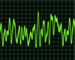 image of a glowing audio or sine wave