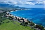 Aerial of Maui, Hawaii coastline with hotel resorts.
