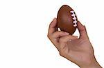 Feminine hand holding miniaturized rubber rugby ball over white background