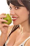 A beautiful smiling woman eating a fresh green apple.   eg - health, diet, nutrition, sin, temptation, etc...