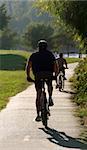 Man riding his bike in a park