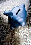 Piggy bank on jigsaws & on the colorful background