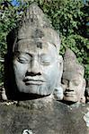 Close up of asura statue at south gate, Siem Reap, Cambodia