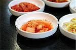 Bowls of Kimchi traditional Korean spicy vegetable pickles