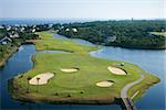 Aerial view of golf course in coastal residential community at Bald Head Island, North Carolina.