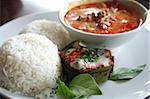 Thai dish of spicy curry steamed fish pudding and rice traditional cuisine